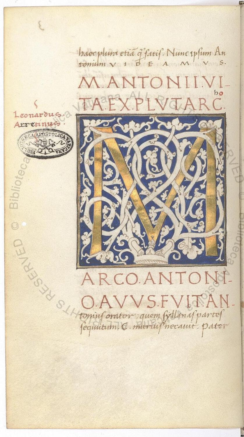 f.3v from Ott.lat.1646. an enormous gold M in the center of a column of humanist text.  There are two regular lines and two all-caps lines above, and the same below.  